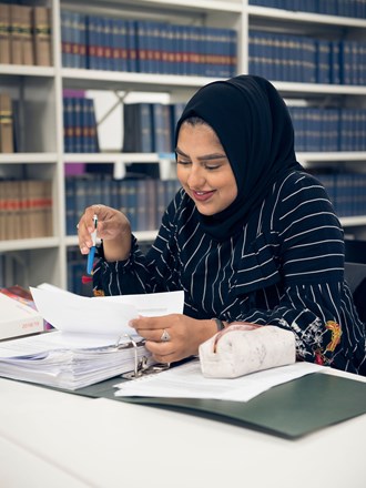 Student working in the library